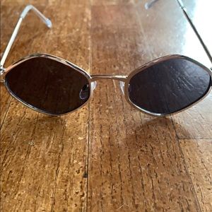 Foster Grant Aislinn gold sunglasses.